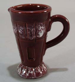 Italian individual creamer in a rose purple color