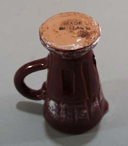 Italian individual creamer in a rose purple color
