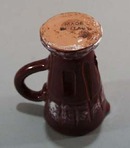 Italian individual creamer in a rose purple color