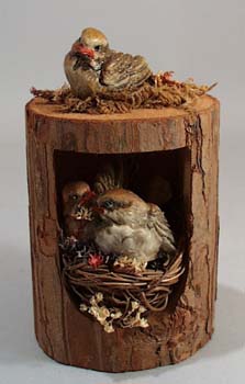 Enesco Lovebirds in tree sitting in Rattan Nest,