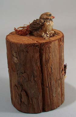 Enesco Lovebirds in tree sitting in Rattan Nest,