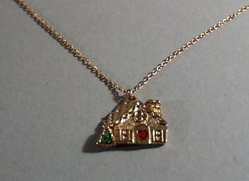 Childs necklace with home with heart