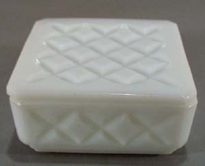 Glass Refrigerator or trinket box with cross design.