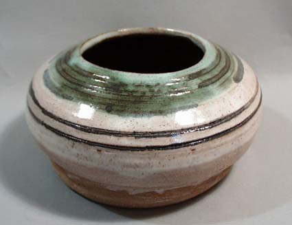 Hand thrown stoneware vase in natural coloring