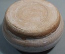 Hand thrown stoneware vase in natural coloring