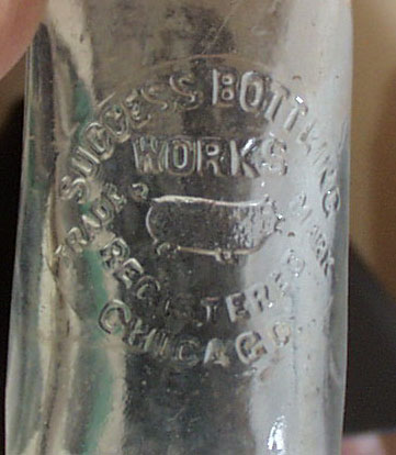 Success Bottling Works Bottle, shows pig
