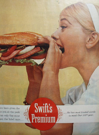 Swifts Premium Couple Eating Sub Sandwich Ad 1960