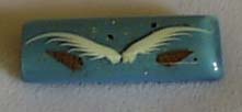 Tie clip made of a blue plastic