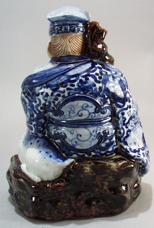 Wise Oriental man & reindeer, old, has cloth impressed bottom