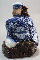 Wise Oriental man & reindeer, old, has cloth impressed bottom