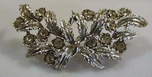 Crystal & Silvertone Leaf Brooch