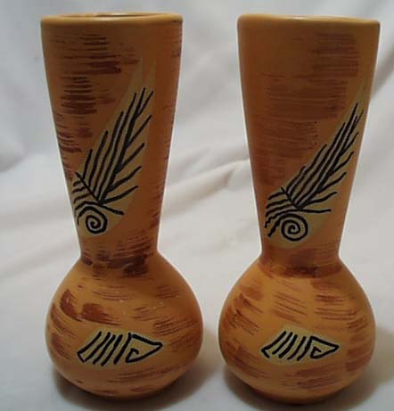 A pair of salmon colored pottery vases/Japan