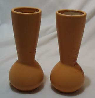 A pair of salmon colored pottery vases/Japan