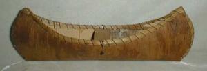 Birchwood Canoe handsewn with grass type trim