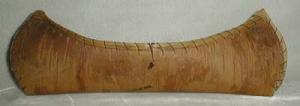 Birchwood Canoe handsewn with grass type trim