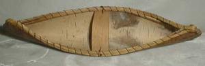 Birchwood Canoe handsewn with grass type trim