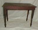 Old red paint doll table
