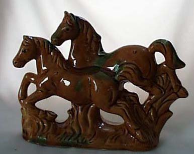 Ceramic Horses in caramel color with green