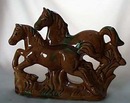 Ceramic Horses in caramel color with green