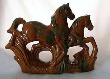 Ceramic Horses in caramel color with green