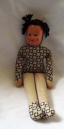 Cloth Bodied Doll Old. Has old plastic face,