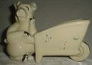 Shawnee ? pig with wheelbarrow planter