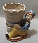 Unusual Holland Boy Holding Flowerpot