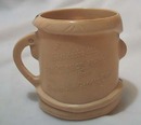 Fred Flintstone advertising mug, blue necktie