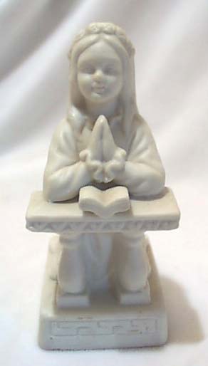 Porcelain girl kneeling figurine