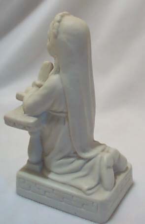 Porcelain girl kneeling figurine