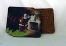 Coasters of Santa by a fire place with a Coke