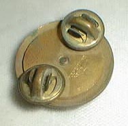 Military button has applied guns