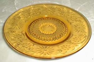 Indiana Glass Daisy Cup Saucer in Amber