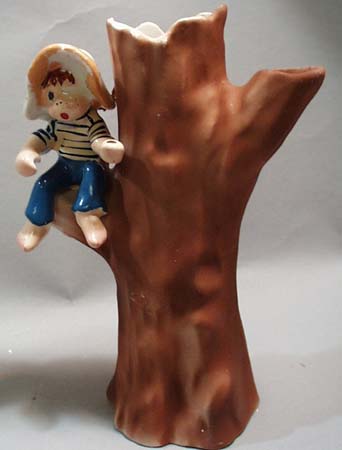 Enesco hillbilly boy in tree