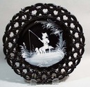 Westmoreland black plate featuring boy with fishing pole