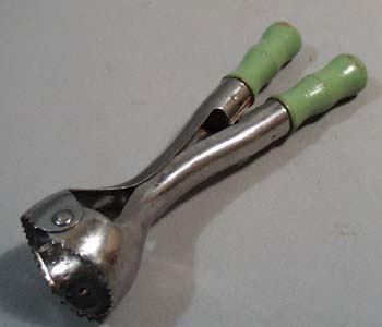 Green handled Melon ball tool