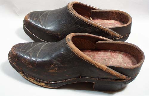 Wooden bottom Shoes with leather uppers