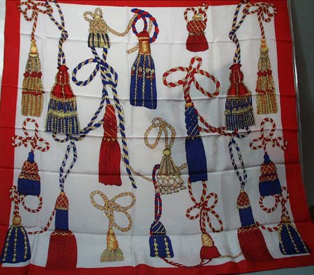 100% silk square scarf featuring tassels