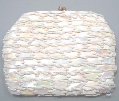 Beads and plastic sequin work on this little clutch purse with chain