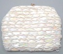 Beads and plastic sequin work on this little clutch purse with chain