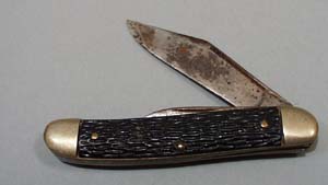 Pocket knife. Brass metal