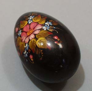 Wooden tole painted Egg.
