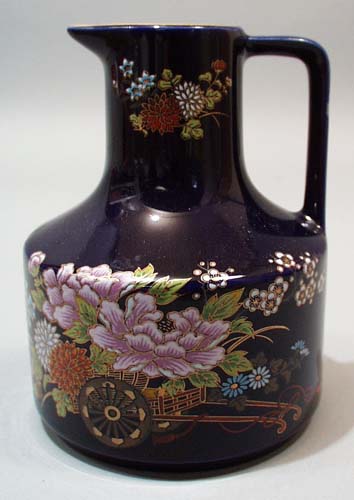 Ottagirl cobalt cruet with cart full of flower