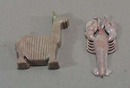 Hard plastic bubblegum machine toys.