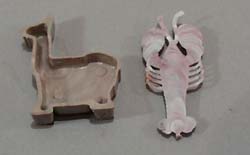 Hard plastic bubblegum machine toys.