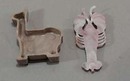 Hard plastic bubblegum machine toys.