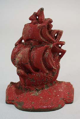 Old red ship bookend,