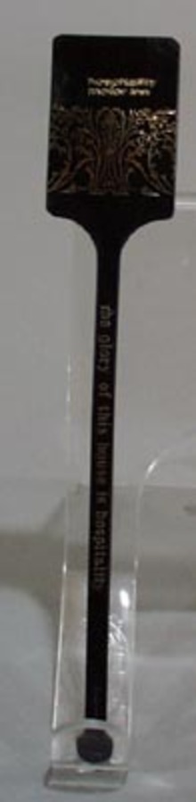 Gold and black stir stick, Hospitality Motor Inn