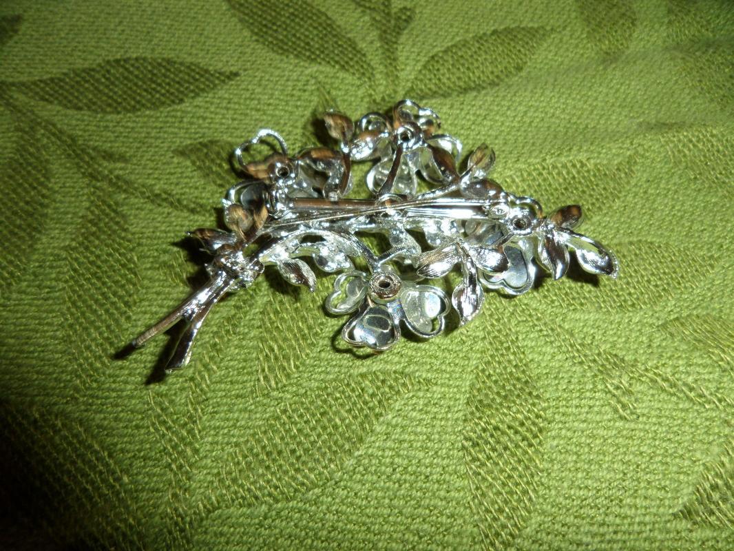 Silver tone brooch