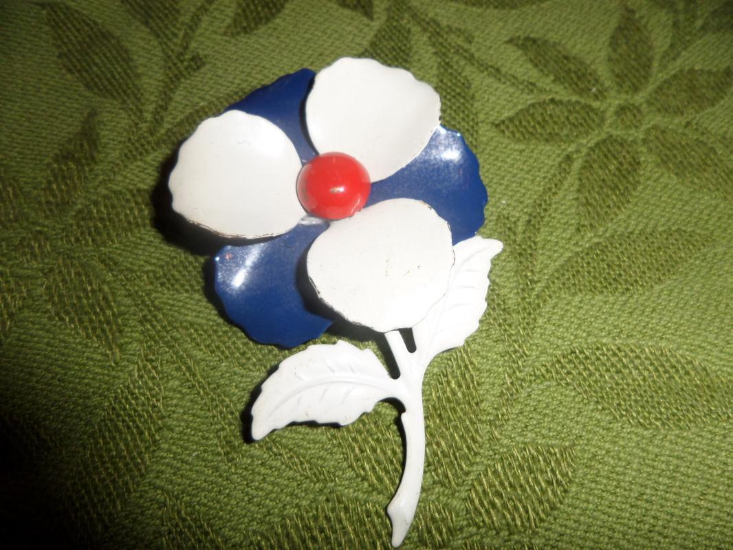 Red white and blue brooch